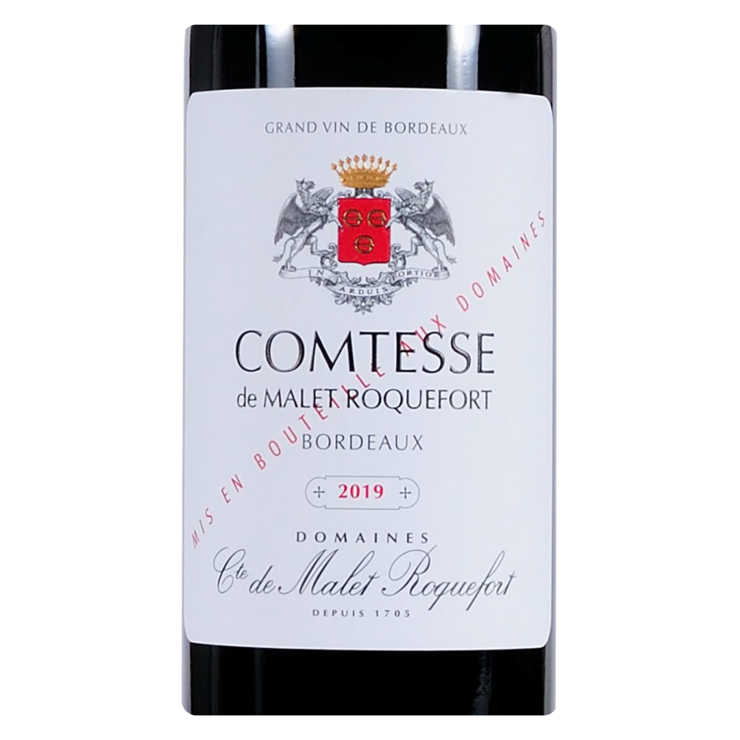 Detalhe do rótulo do vinho Comtesse de Mallet Roquefort, exibindo a denominação Bordeaux AOC e o ano da safra 2020.