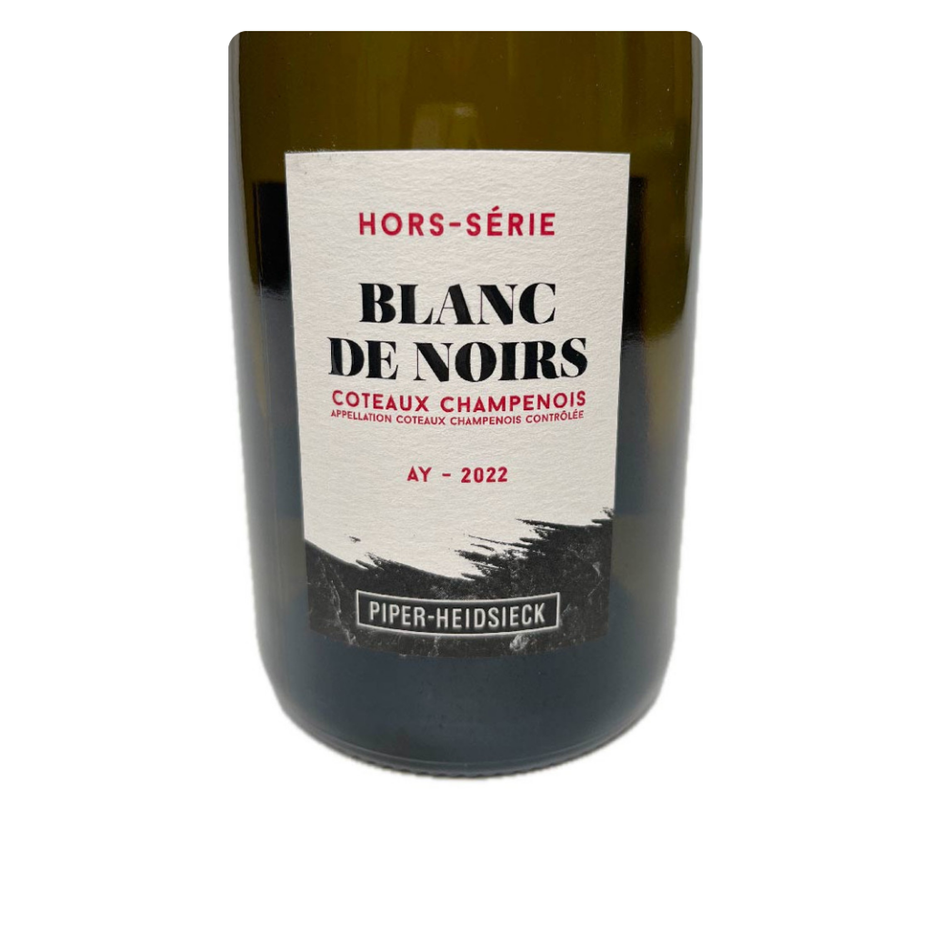 Close do rótulo do Coteaux Champenois Aÿ, com detalhes da safra 2022 e a indicação Blanc de Noirs.