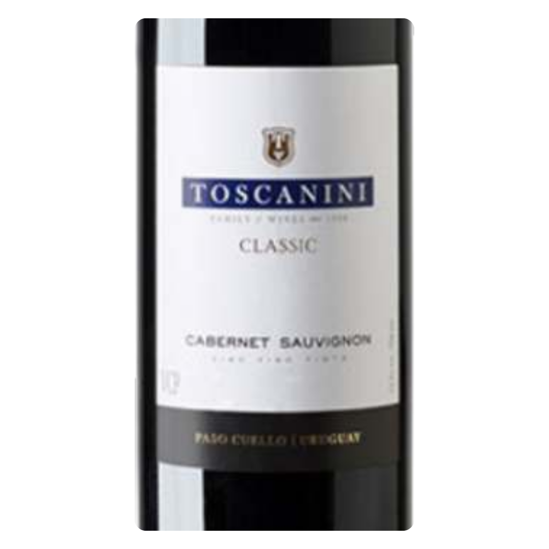 Close-up do rótulo do vinho Toscanini Classic Cabernet Sauvignon, exibindo o nome da bodega, a uva Cabernet Sauvignon e a origem Uruguai.